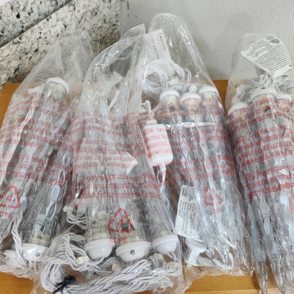 4 packages large icicles blinking trickling lights